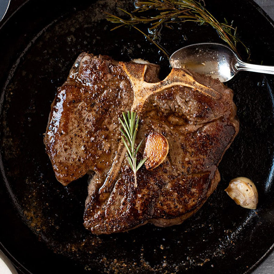 TBone steak with garlic and rosemary — Foodilemma